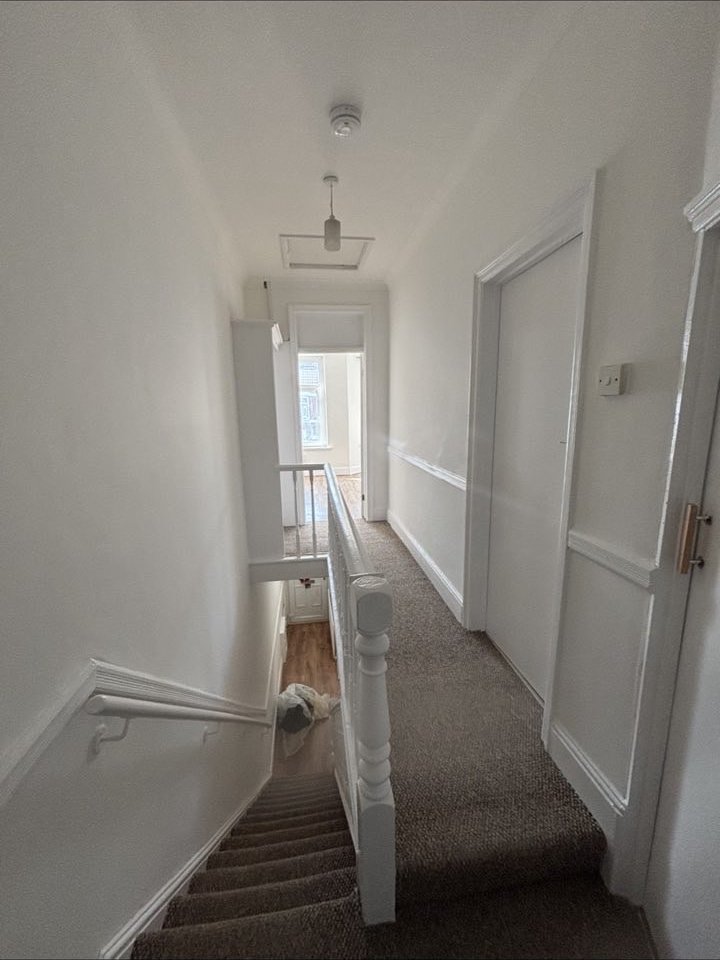 Landing and hallway repainted white
